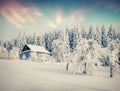 Sunny winter morning in the mountain village after heavy snowfall. Royalty Free Stock Photo
