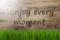 Sunny Wooden Background, Gras, Quote Enjoy Every Moment Royalty Free Stock Photo