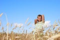 Sunny young beauty girl the field under blue sky 3 Royalty Free Stock Photo