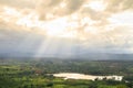 Sunray over lake and mountain in Khao Kho District, Thailand Royalty Free Stock Photo