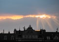 Sunrays above the old building Royalty Free Stock Photo