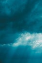 Sunrays Through Blue Rainy Dramatic Sky. Natural Abstract Background Royalty Free Stock Photo