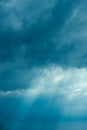 Sunrays Through Blue Rainy Dramatic Sky. Natural Abstract Background Royalty Free Stock Photo