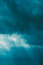 Sunrays Through Blue Rainy Dramatic Sky. Natural Abstract Background Royalty Free Stock Photo