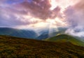 Sunrays over mountain range. Royalty Free Stock Photo