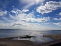 Lake Ontario Beach under Bright Clouds Royalty Free Stock Photo