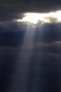 Sunrays Shining Above Mountains in Storm Clouds Sun Rays Royalty Free Stock Photo