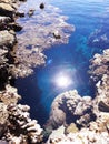 Sunreflection over blue sea water of the coral reef Royalty Free Stock Photo