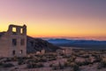 Sunrise above abandoned building in Rhyolite, Nevada Royalty Free Stock Photo