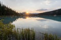 Sunrise above beautiful turquoise glacier lake with turquoise waters and reflections, Canada Royalty Free Stock Photo