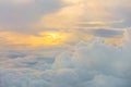 Sunrise above clouds from airplane window . Royalty Free Stock Photo