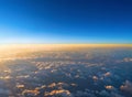Sunrise above clouds from an airplane window. Abstract nature ba Royalty Free Stock Photo
