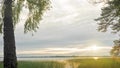 Sunrise above the forest lake. Time-lapse Royalty Free Stock Photo