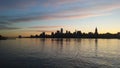 Sunrise above Manhattan, New York, NY - View across Hudson River from Pier A Park in Hoboken, NJ. Royalty Free Stock Photo