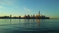 Sunrise above Manhattan, New York, NY - View across Hudson River from Pier A Park in Hoboken, NJ. Royalty Free Stock Photo