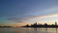 Sunrise above Manhattan, New York, NY - View across Hudson River from Pier A Park in Hoboken, NJ. Royalty Free Stock Photo