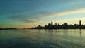 Sunrise above Manhattan, New York, NY - View across Hudson River from Pier A Park in Hoboken, NJ. Royalty Free Stock Photo