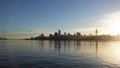 Sunrise above Manhattan, New York, NY - View across Hudson River from Pier A Park in Hoboken, NJ. Royalty Free Stock Photo