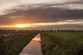 Sunrise above meadows in The Netherlands Royalty Free Stock Photo