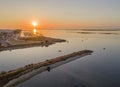 Sunrise aerial seascape view of Olhao salt marsh Inlet, waterfront to Ria Formosa natural park. Algarve. Royalty Free Stock Photo