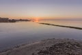 Sunrise seascape view of Olhao salt marsh Inlet, waterfront to Ria Formosa natural park. Algarve. Portugal. Royalty Free Stock Photo