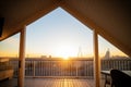 sunrise, aframe silhouette, balcony visible Royalty Free Stock Photo