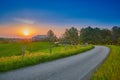 Sunrise Along a Counrty Road with Barn Royalty Free Stock Photo