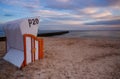 Sunrise on the Baltic Sea coast, deck chair, beach, Kolobrzeg, Poland.