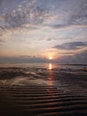 sunrise on the beach with a beautiful stretch of sand