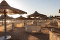 Sunrise on the beach with parasol overlooking the Red Sea in Hurghada, Egypt Royalty Free Stock Photo