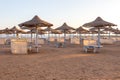 Sunrise on the beach with parasol overlooking the Red Sea in Hurghada, Egypt Royalty Free Stock Photo