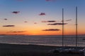 Sunrise on the beach with two catamarans stranded on the shore in Mojacar Almeria Royalty Free Stock Photo