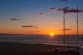 Sunrise on the beach with two catamarans stranded on the shore in Mojacar Almeria Royalty Free Stock Photo