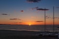 Sunrise on the beach with two catamarans stranded on the shore in Mojacar Almeria Royalty Free Stock Photo