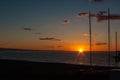 Sunrise on the beach with two catamarans stranded on the shore in Mojacar Almeria Royalty Free Stock Photo