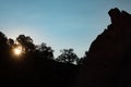 Sunrise Behind Giant Rock Formation Silhouette