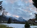 Sunrise behind the mountain range in Garmisch-Partenkirchen Bavaria Southern Germany