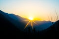 Sunrise behind the mountains of Rishikesh