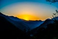 Sunrise behind the mountains of Rishikesh