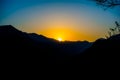 Sunrise behind the mountains of Rishikesh