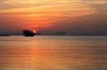 Sunrise behind the traditional fishing Dhow Royalty Free Stock Photo