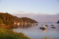 Sunrise and boats in the harbour of Mangonui, New Zealand