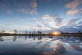 Sunrise in the bog. Icy cold marsh. Frosty ground. Swamp lake and nature. Freeze temperatures in moor. Muskeg natural environment.