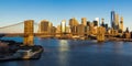 Sunrise on the Brooklyn Bridge and the skyscrapers of Lower Manhattan. New York City Royalty Free Stock Photo
