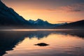 Sunrise on Canadian rockies with rocks on Medicine Lake at Jasper national park Royalty Free Stock Photo