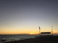 Sunrise and catamaran boat at the beach Royalty Free Stock Photo