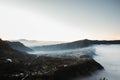 Sunrise at Cemoro Lawang village near Gunung Bromo or Mount Bromo is covered by clouds at dawn Royalty Free Stock Photo