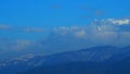 Sunrise Clouds With Mountains. The Sun Rises Above The Mountains. Sky Texture. Timelapse. Royalty Free Stock Photo