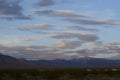 Sunrise clouds over mountain range and valley in Mojave Desert, USA Royalty Free Stock Photo