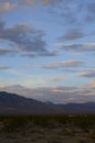 Sunrise clouds over mountain range and valley in Mojave Desert, USA Royalty Free Stock Photo